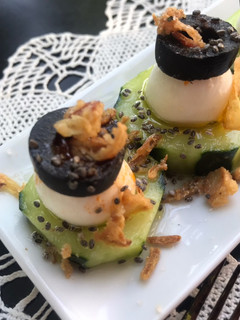 Una foto de Tapa de "pepino del Mediterráneo"