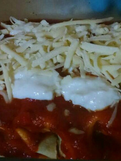 Una foto de Canelones de verdura, salsa blanca y tuco de carne