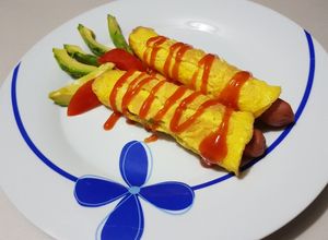 Una foto de Huevo con salchicha (Perritos con cobija)