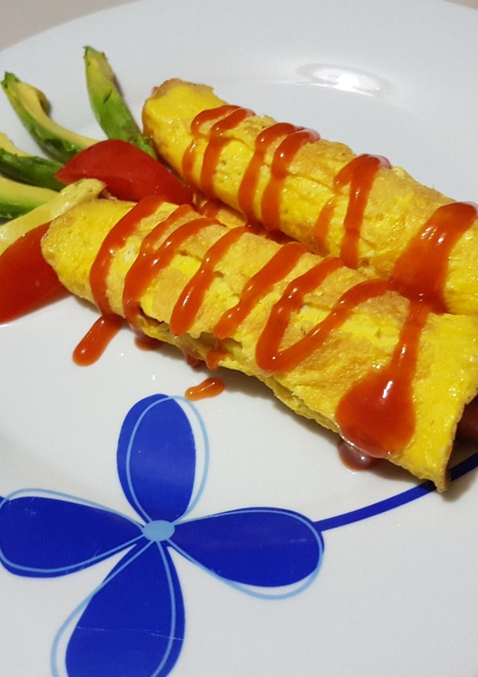 Una foto de Huevo con salchicha (Perritos con cobija)