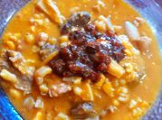 Una foto de locro con mondongo