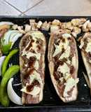Canoas de berenjenas decoradas con vegetales
