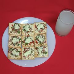 A picture of Cream crackers canapés.