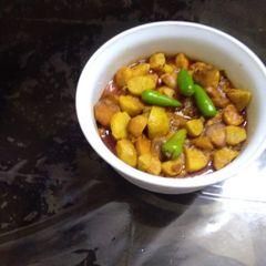 A picture of Yam Potatoes curry.
