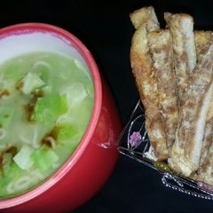 Cabbage noodles soup with potato masala sticks A picture of Cabbage noodles soup with potato masala sticks.