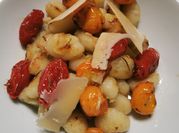 Una foto de gnocchi de queso
