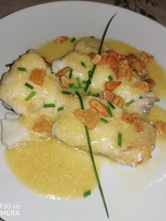 Una foto de Bacalao al pil pil