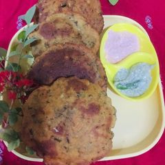 A picture of Malabar Style Ney pathiri (fried masala rice Pooris).