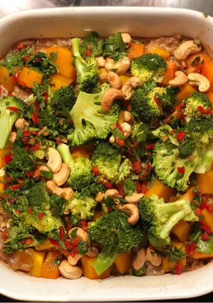 A picture of One dish sticky rice, broccoli, squash and sweet potato with chilli and ginger dressing.