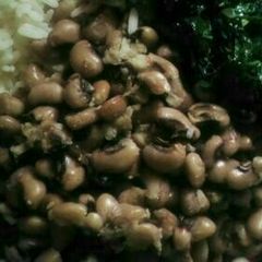 A picture of Plain bean and rice with vegetable.
