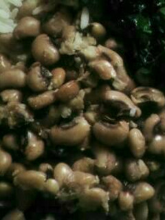 A picture of Plain bean and rice with vegetable.