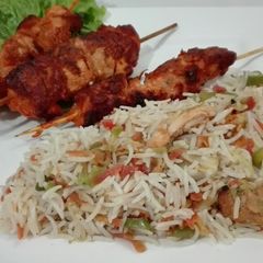 Kasturi Kabab With Chicken Vegetable Fried Rice A picture of Kasturi Kabab With Chicken Vegetable Fried Rice.