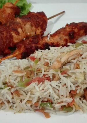 A picture of Kasturi Kabab With Chicken Vegetable Fried Rice.
