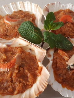 Una foto de Vieiras gratinadas al horno