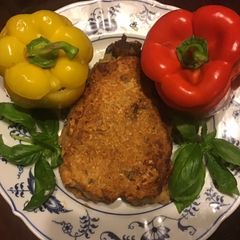 A picture of California Farm Eggplant Dinner with Stuffed Peppers.