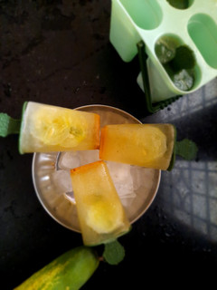 A picture of Jaljeera cucumber popsicles.