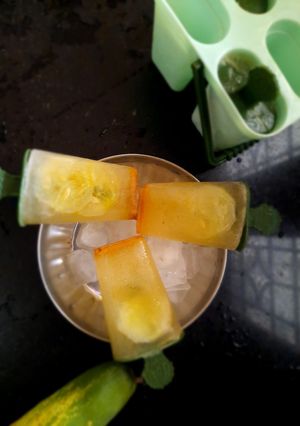 A picture of Jaljeera cucumber popsicles.
