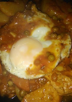 Una foto de Bifecitos de cerdo a la portuguesa con yapa..
