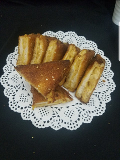 A picture of Fried bread triangles.