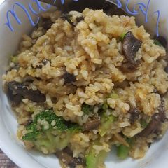 A picture of High vitamin d mushroom, rice and broccoli.