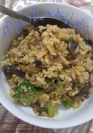 A picture of High vitamin d mushroom, rice and broccoli.