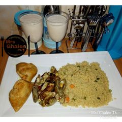 A picture of Couscous with boil egg sauce and moimoi.