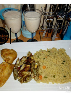 A picture of Couscous with boil egg sauce and moimoi.