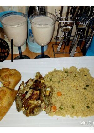 A picture of Couscous with boil egg sauce and moimoi.