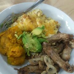 A picture of Baked cauliflower and chicken necks.