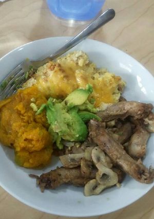 A picture of Baked cauliflower and chicken necks.