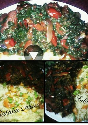 A picture of Vegetables couscous with stir fried spinach.