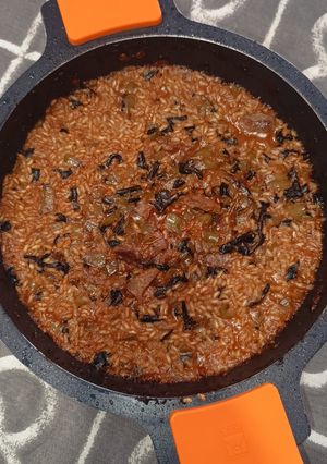 Una foto de Arroz de Presa Ibérica con Trompetas de la Muerte
