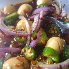 A picture of Marinated quail eggs.