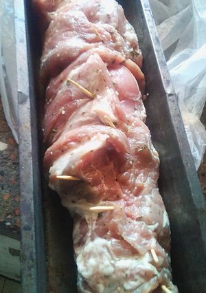 Una foto de Arrollado de Bondiola de chancho Rellena