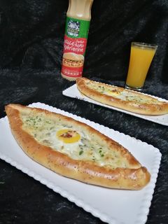صورة لوصفة بيتزا بالصلصة البيضاء