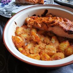 A picture of Red pesto & salmon gnocchi.