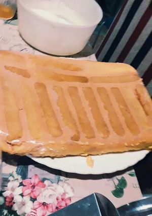 Una foto de Postre de vainillas y flan (postre borracho)