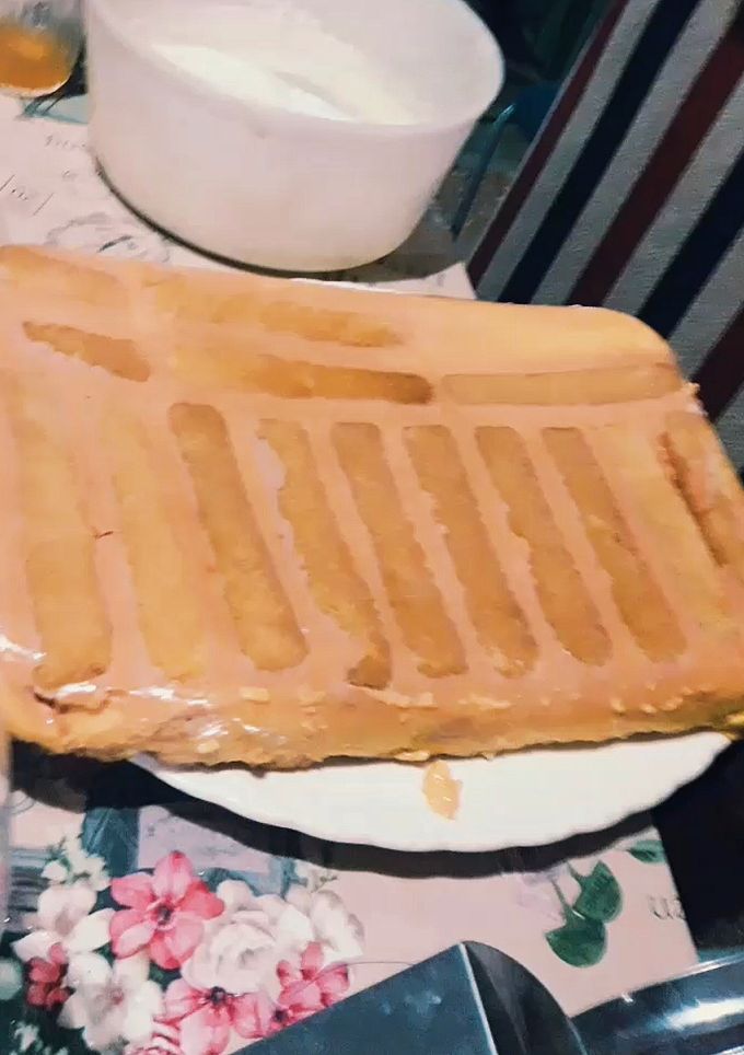 Una foto de Postre de vainillas y flan (postre borracho)