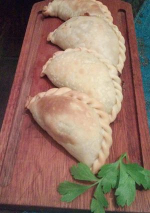 Una foto de Empanadas de cebolla y queso