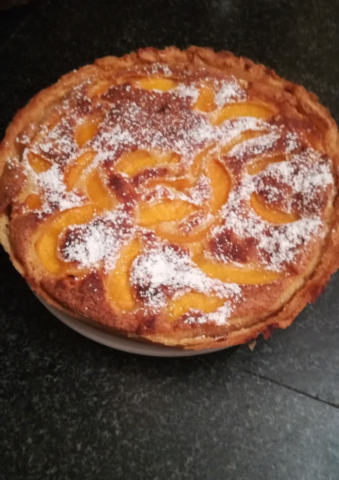 Una foto de Tarta de melocotón y almendras