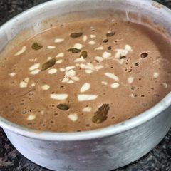 A picture of Chocolate ice cream with biscuits.
