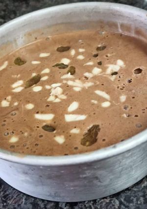 A picture of Chocolate ice cream with biscuits.