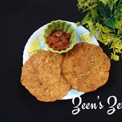 A picture of Wheat Flour and Radish Pooris.