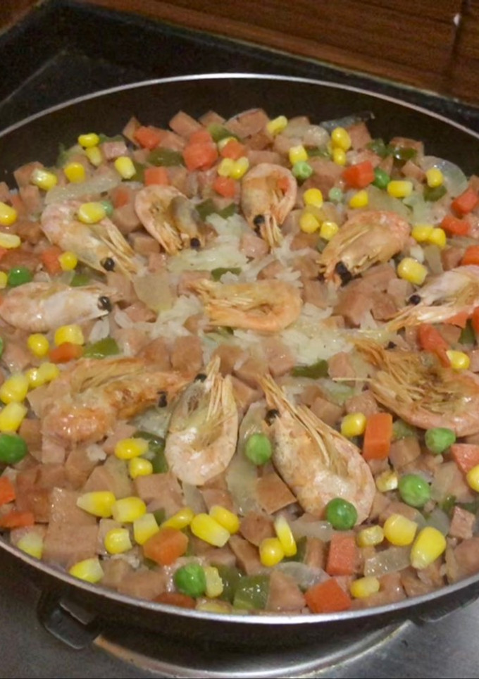 Una foto de Paella a mi estilo