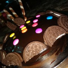 Vanila sponge with ganache icing(eggless) A picture of Vanila sponge with ganache icing(eggless).