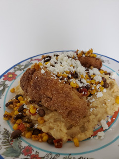A picture of Brad's Latin inspired fried cod and polenta.