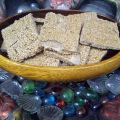 A picture of Till & coconut gud patti (chikki).