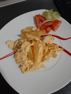 Una foto de Patatas con huevo revuelto