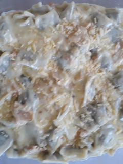 Una foto de Ravioles con crema de champiñones