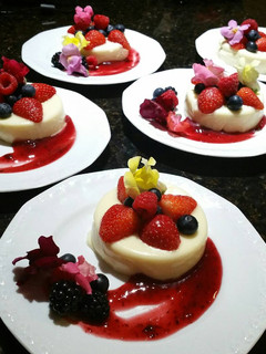 A picture of Vanilla Panna Cotta & Berry Coulis.